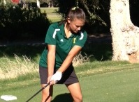 Alee Balanon preparing to swing her golf club during a match.