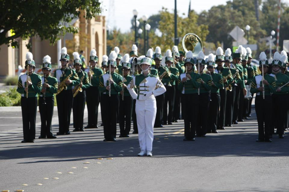 The marching band marches in the Homecoming parade.