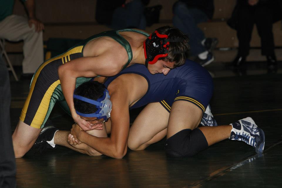 Senior Dalton Gualco wrestling his opponent at the Tracy vs. West match last year.