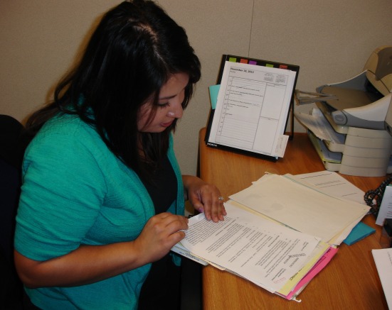 Susan Rosales works in her office.