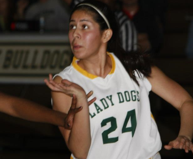 Sarah Rodriguez blocks out Lincoln opponent on the free throw lane.