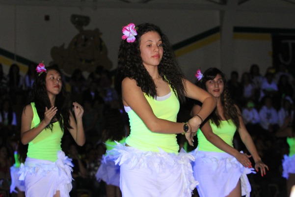 Polynesian Clubs performs their dance at the Hoopla Rally. 