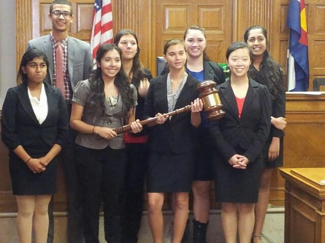 Mock+Trial+team+poses+during+their+competition.