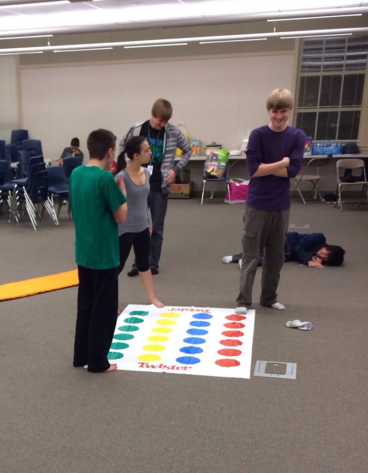 Students in the Key Club play a game of Twister during their Awake-a-thon fundraiser.
