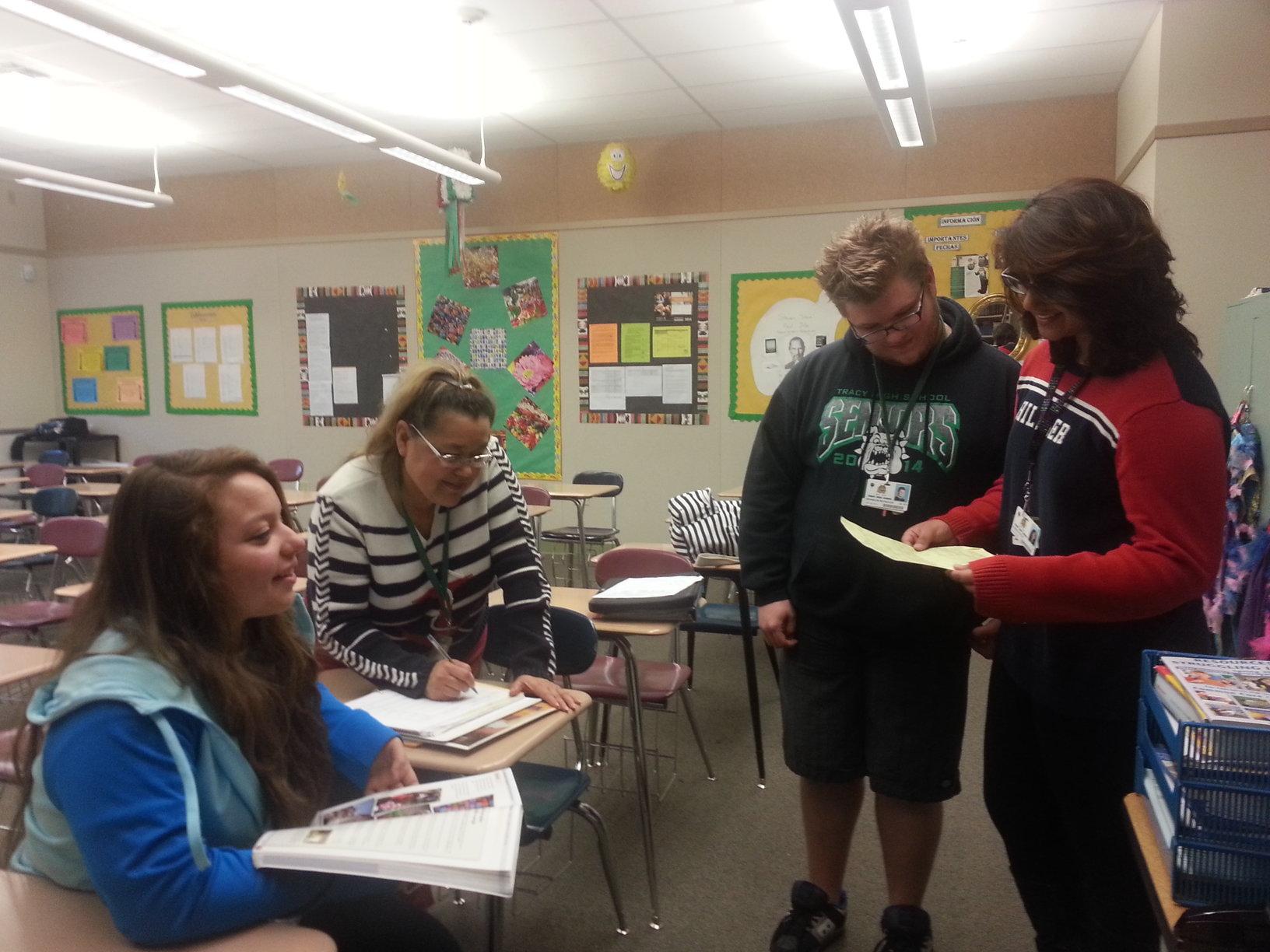 Mrs. Fonseca instructs students on Spanish.