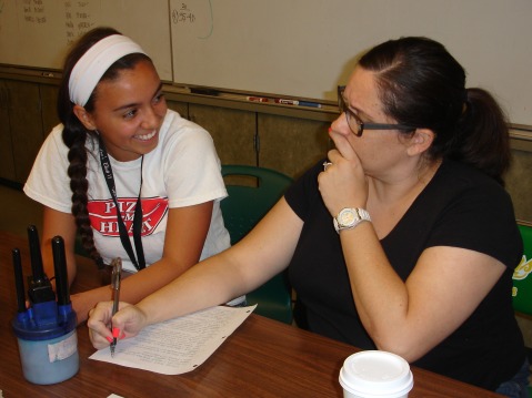 Junior Alessandra Rodriguez discusses future ASB plans with activities director Alayna Carter. 