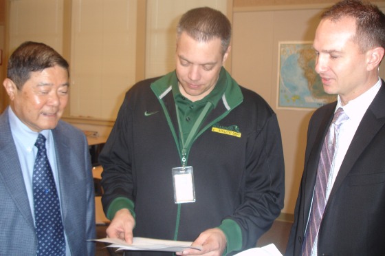 Principal Jason Noll meets with WASC Chairman Norman Masuda and WASC committee member Jeff Percell on March 5. 