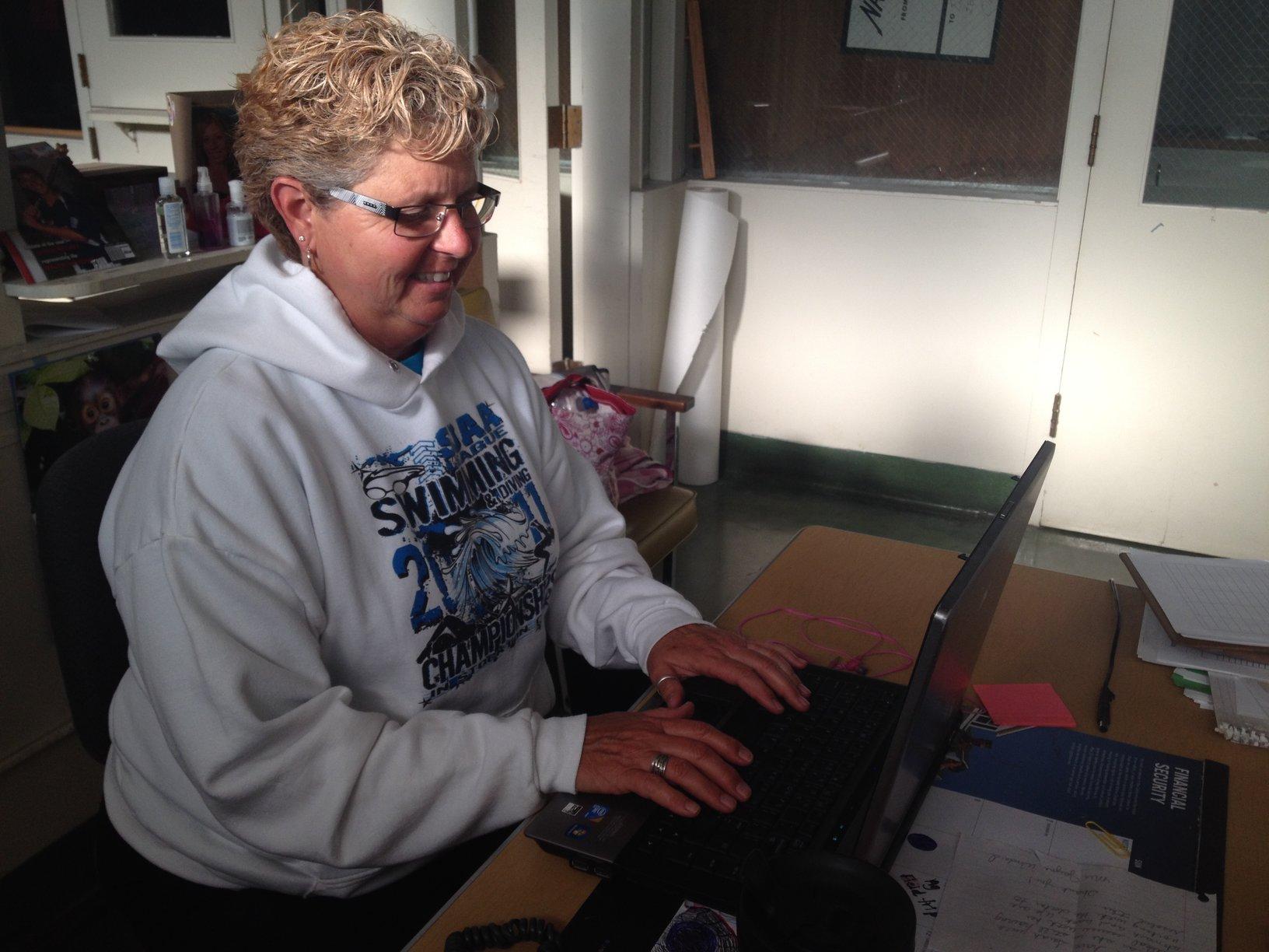 Special Education teacher Stacey Carniglia plans out the schedule for the week.