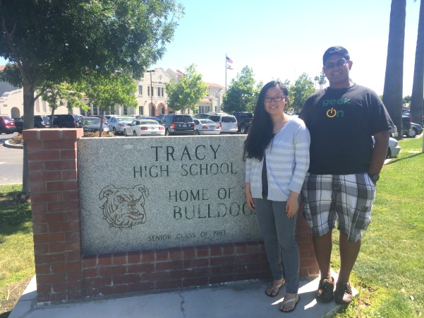 Hilarie Sit, salutatorian, and Aditya Gupta, valedictorian, stand in front of the A Building at Tracy High.