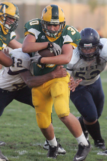 Sophomore Chris Coykendall running the ball.