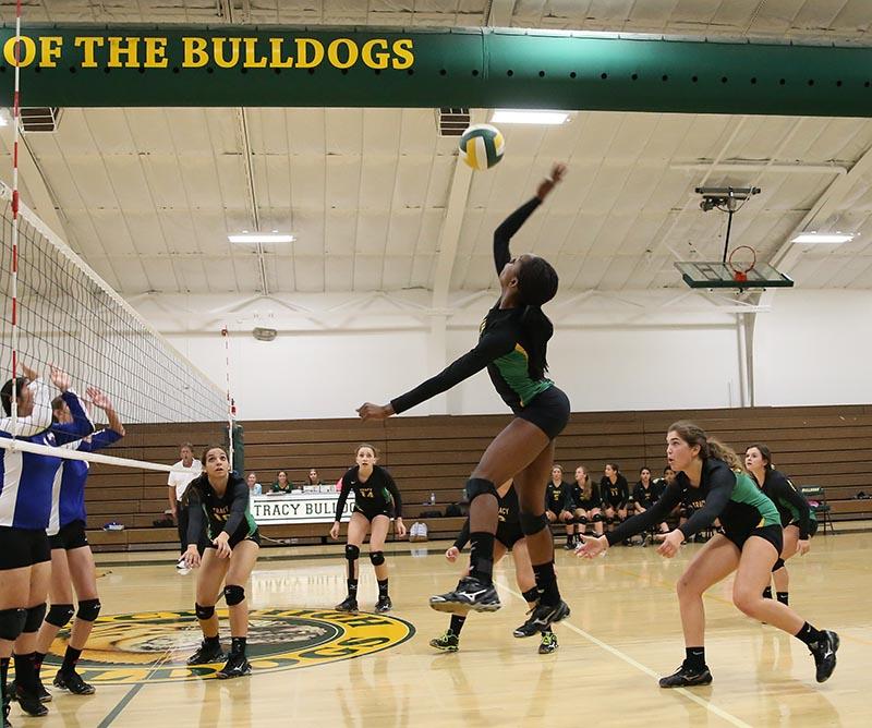 Junior Grace Murphy spikes the ball in a game against Kimball.