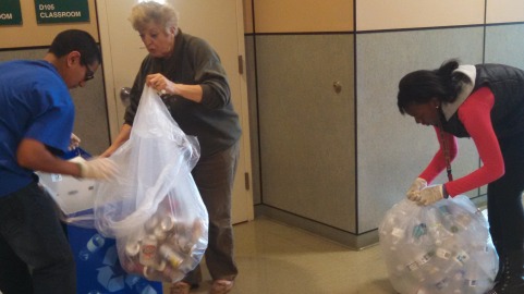 Rudy Galindo, Lucia Costa aide to Life Skills teacher Diana Wing, and Naomi Beasley sort out the plastic bottles from cans in the D building as part of the recycling program.
