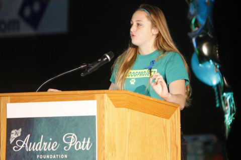 Bulldog Project President Jenna Wesley speaks at the school-wide rally in honor of Audrie Pott.