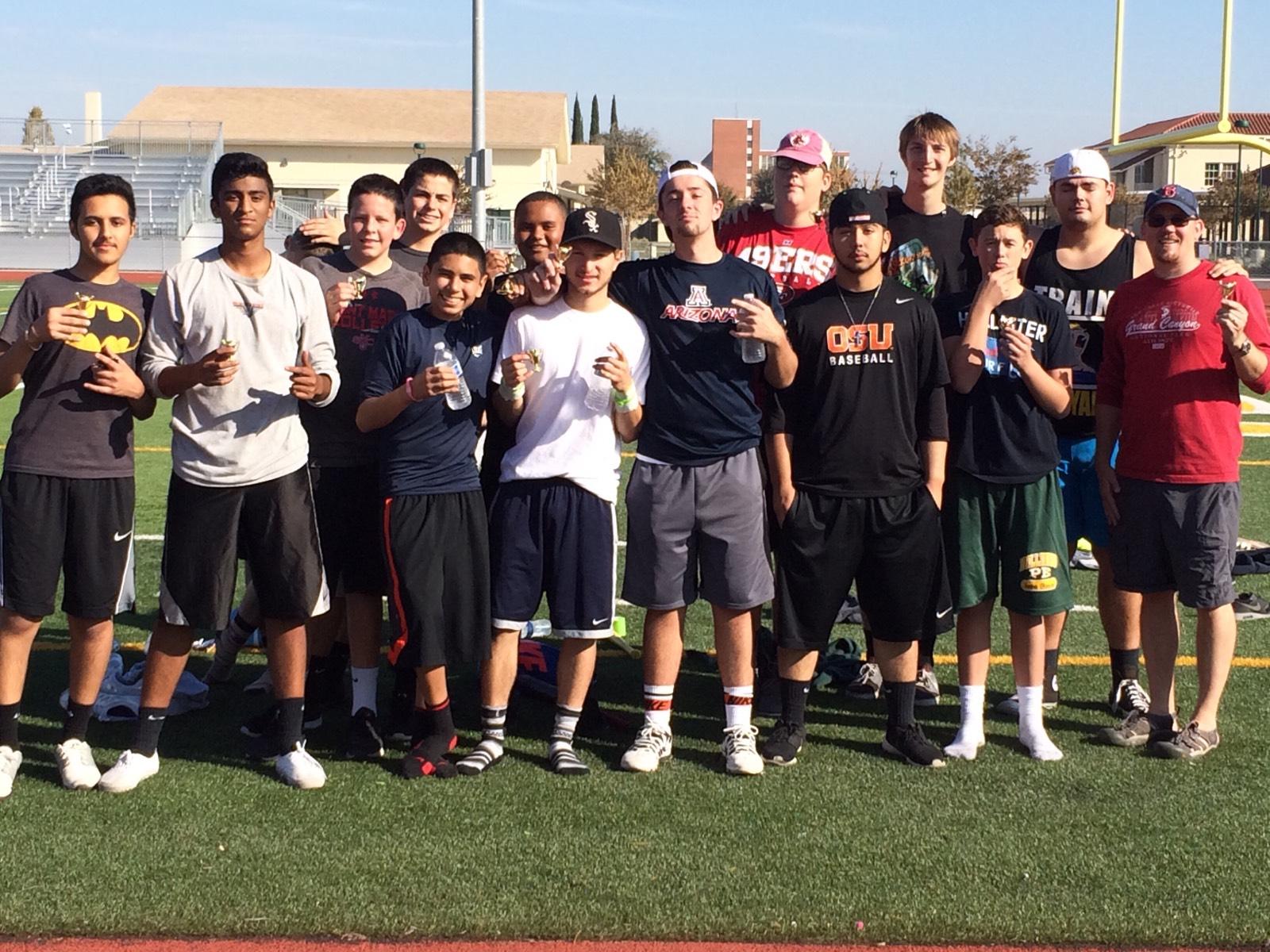 Tournament participants take a victory photo after game play on Saturday, Nov 7. -Elizabeth McIntyre
