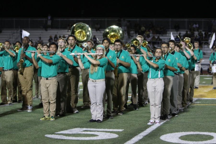 Band students perform at the half-time show at the varsity Tracy versus Tokay football game.