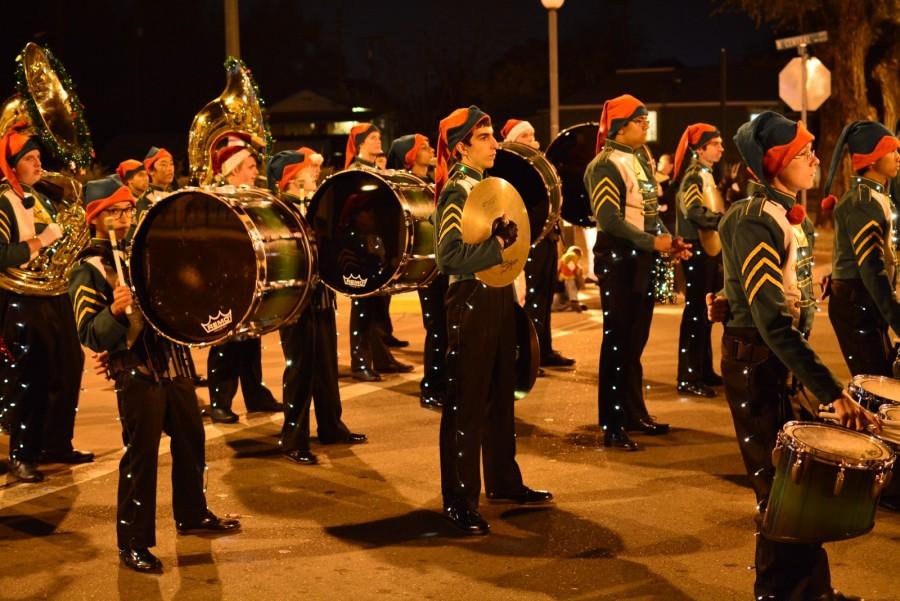 Tracy band marches downtown in lights and elf/Santa hats at the annual Holiday Parade on Dec 5