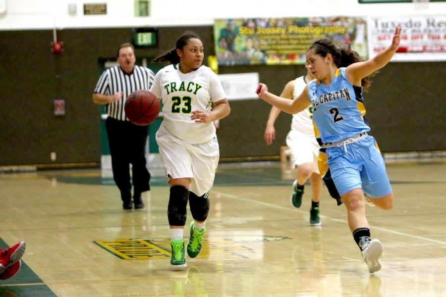 Senior Jazmyn Gonzales dribbles up the court in a game against El Capitan .