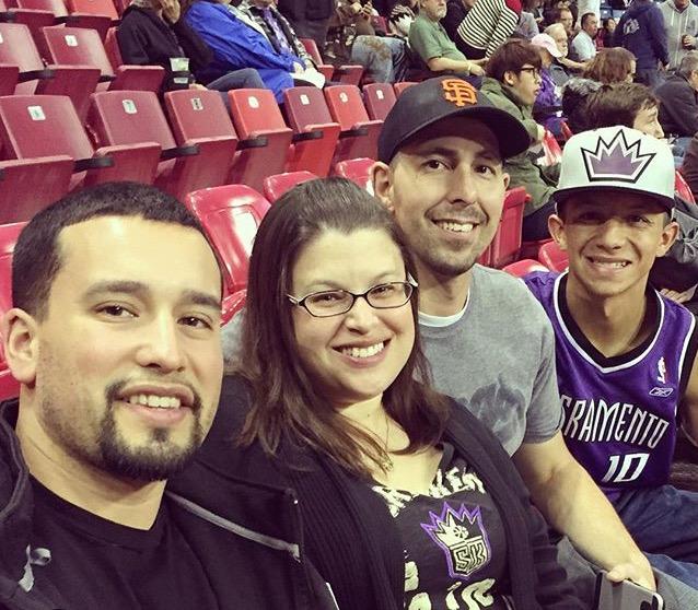 Joshua Chayrez, Nicole Sawvel, Jeremy Sawvel, and Marcus Guillen taking a picture before the Kings game against San Antonio on Nov. 9.