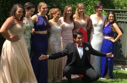 A group of seniors pose for a photo at Prom.
